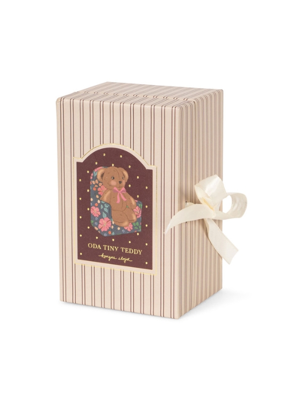 beżowy miś z różową kokardką z fotelem w kwiaty i pudełkiem do przechowywania